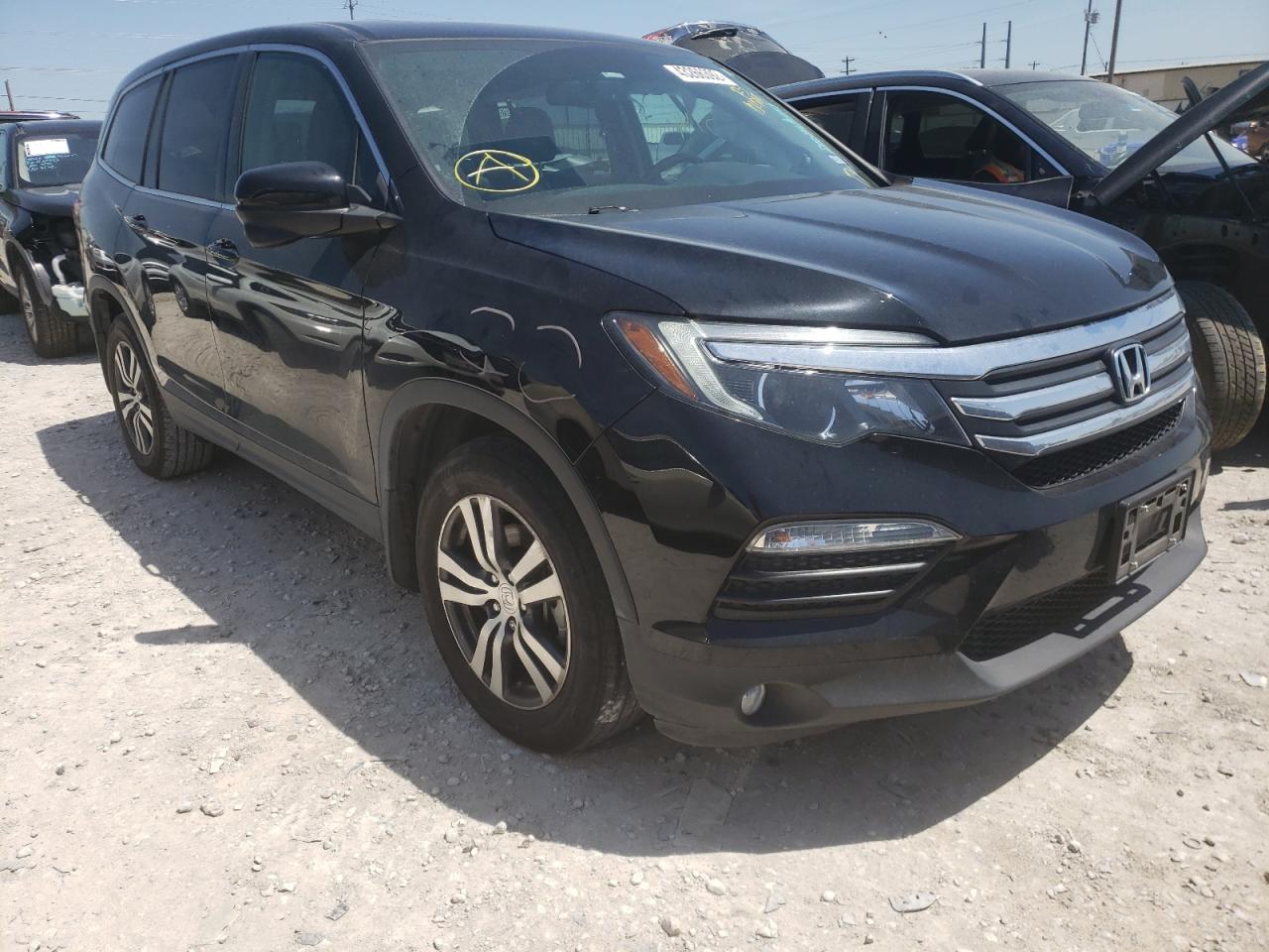 HONDA PILOT EXL 2016 with VIN 5FNYF6H50GB104794 - Photo from auction