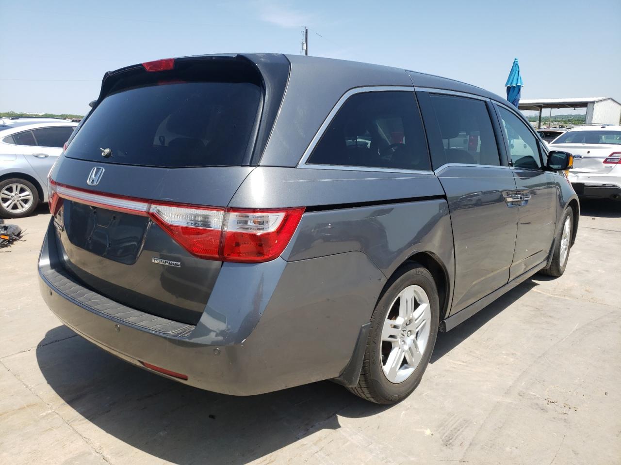 Photo 4 from auction – 2011 HONDA ODYSSEY TO with VIN 5FNRL5H96BB076146