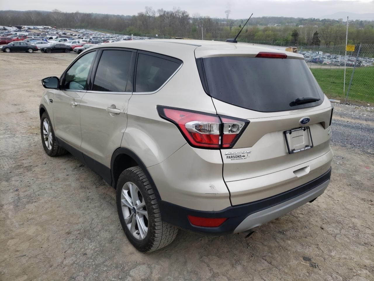 Photo 3 from auction – 2017 FORD ESCAPE SE with VIN 1FMCU9GD7HUB75893