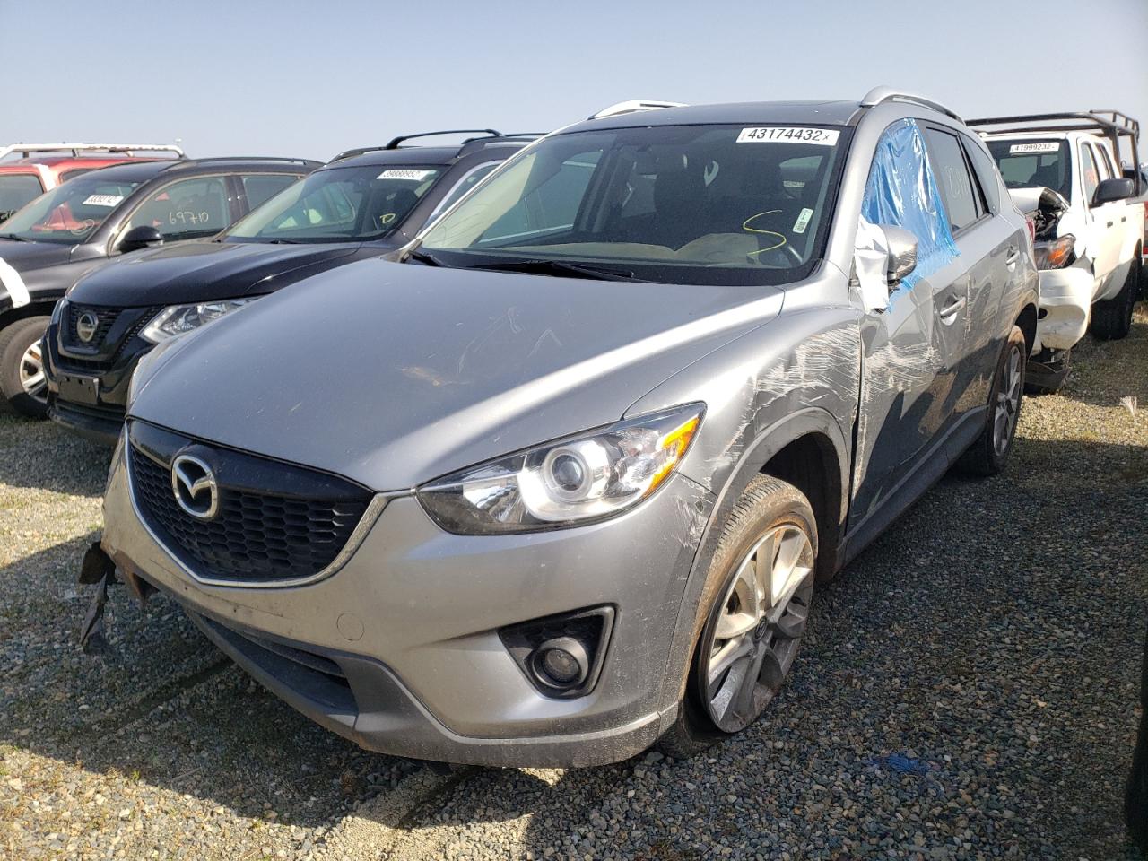 Photo 2 from auction – 2014 MAZDA CX-5 GT with VIN JM3KE2DY7E0357504