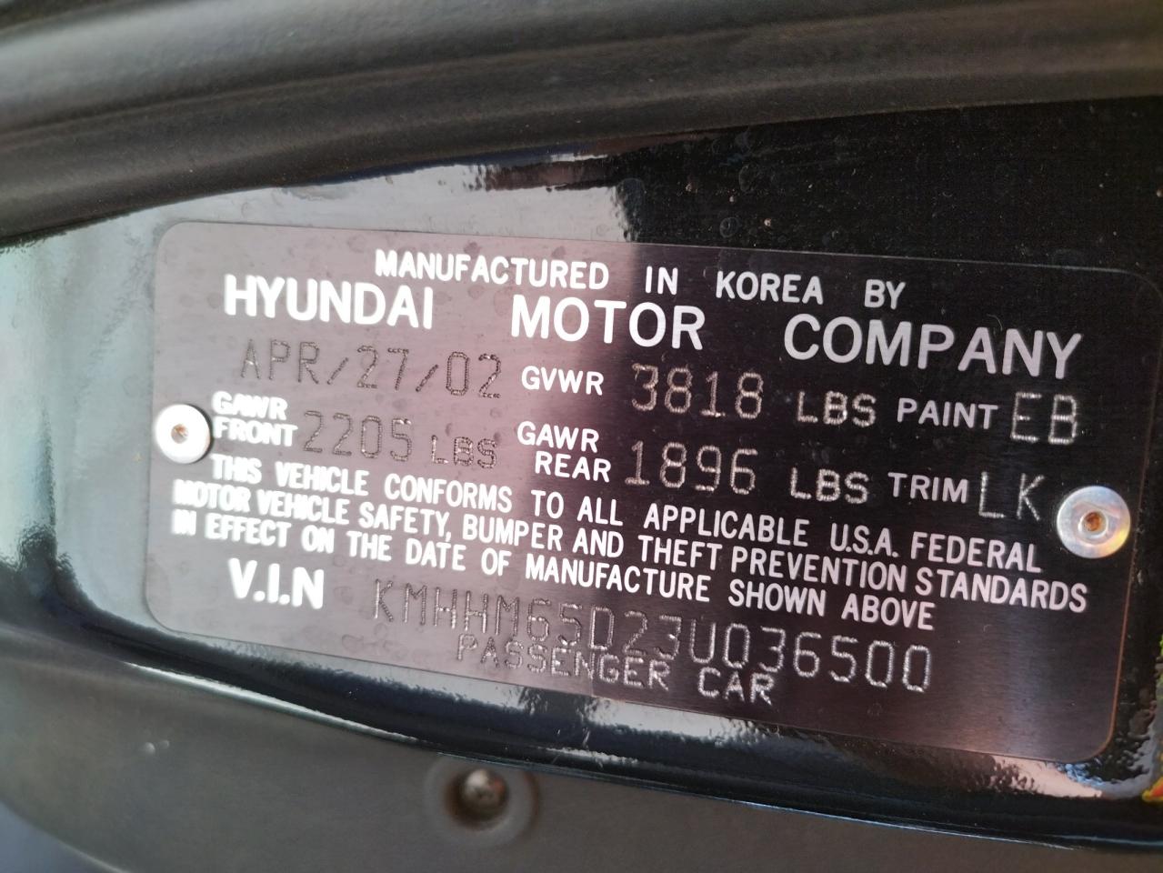 Photo 10 from auction – 2003 HYUNDAI TIBURON with VIN KMHHM65D23U036500