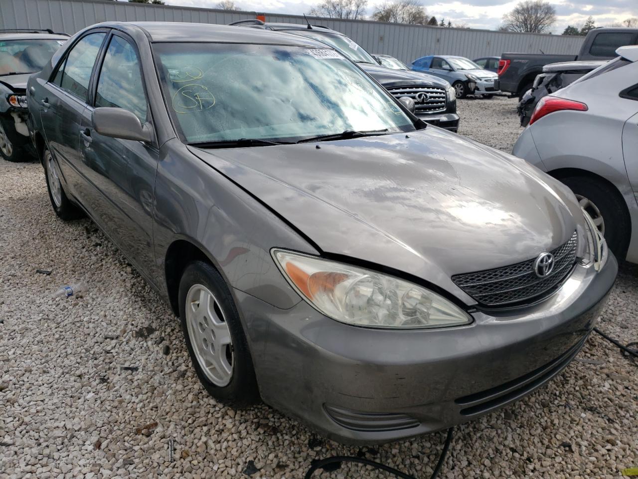 TOYOTA CAMRY LE 2002 with VIN 4T1BF30K72U509486 - Photo from auction