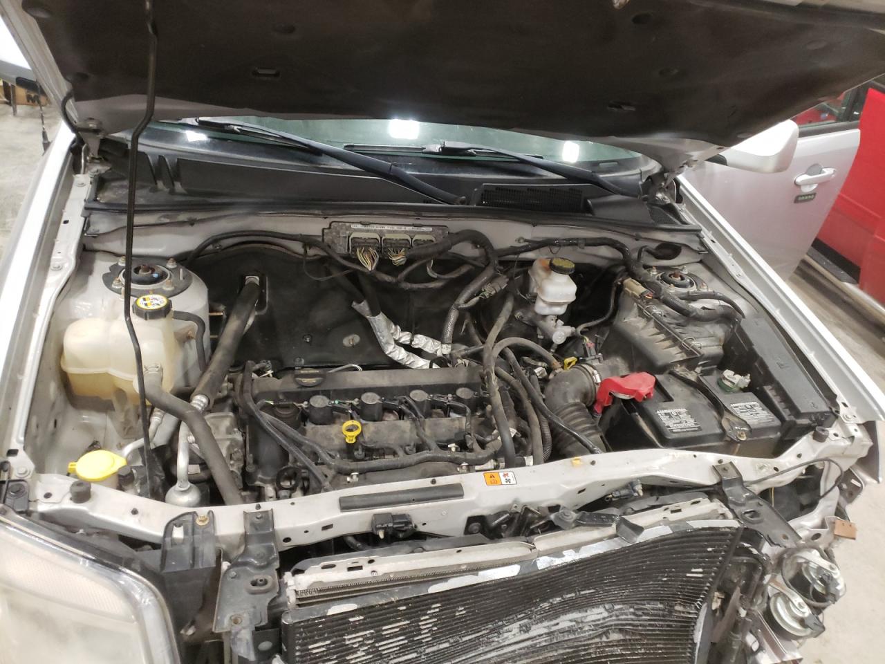 Photo 7 from auction – 2010 MERCURY MARINER PR with VIN 4M2CN9H7XAKJ20487