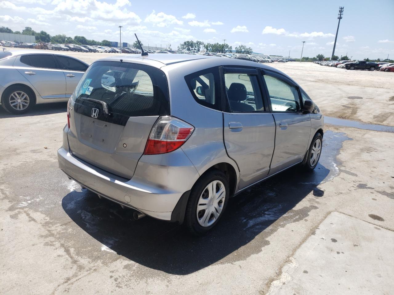 Photo 4 from auction – 2009 HONDA FIT with VIN JHMGE88249S073277