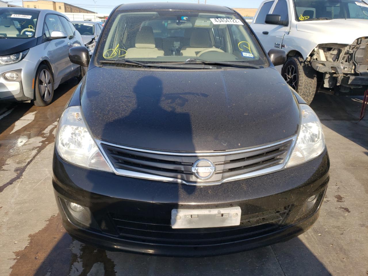 Photo 9 from auction – 2011 NISSAN VERSA S with VIN 3N1BC1CP3BL361097