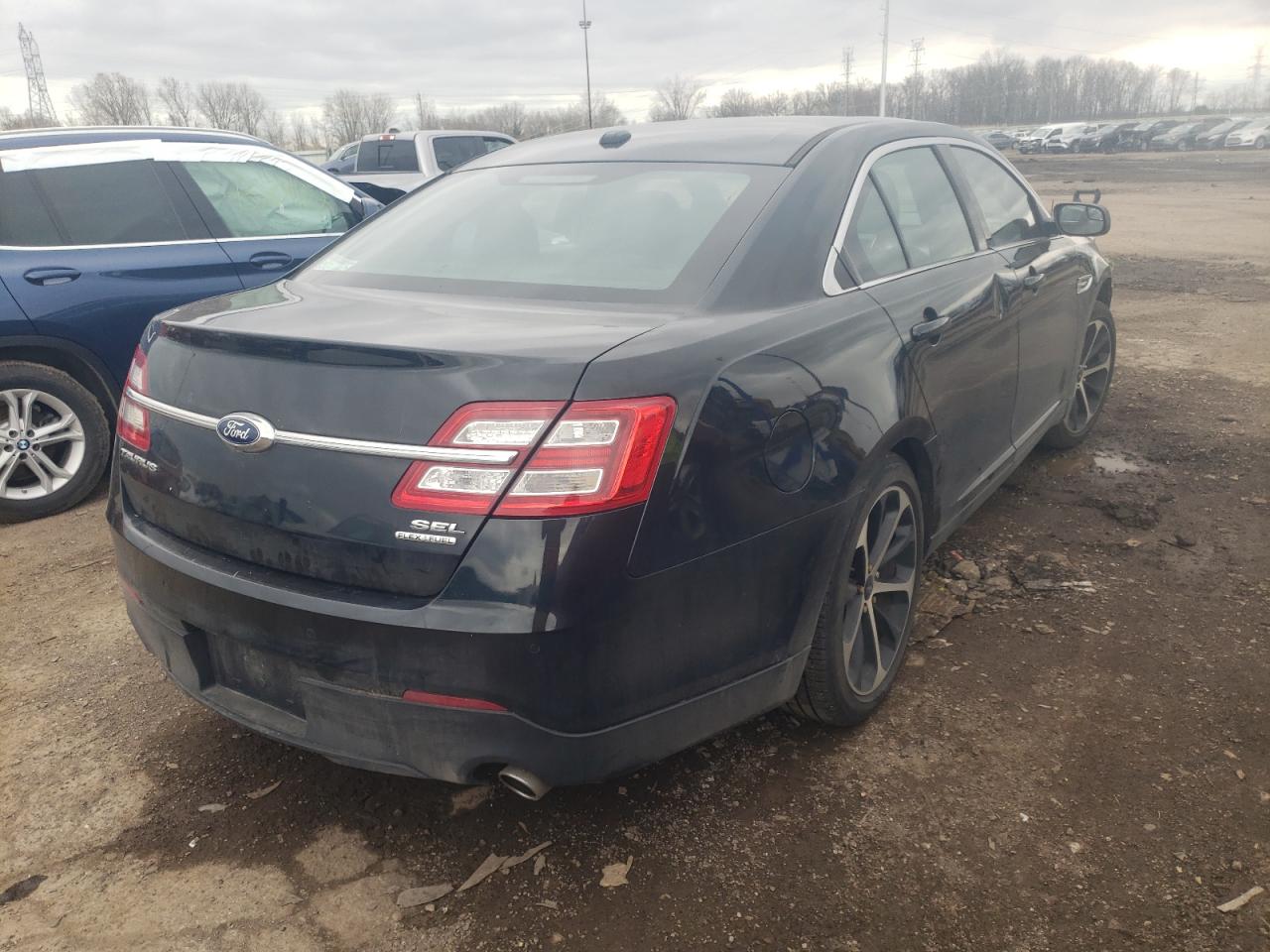 Photo 4 from auction – 2014 FORD TAURUS SEL with VIN 1FAHP2E89EG129030