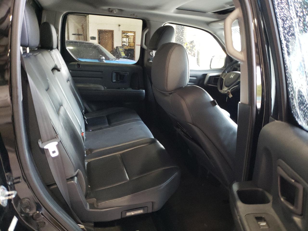 Photo 6 from auction – 2013 HONDA RIDGELINE with VIN 5FPYK1F51DB012842
