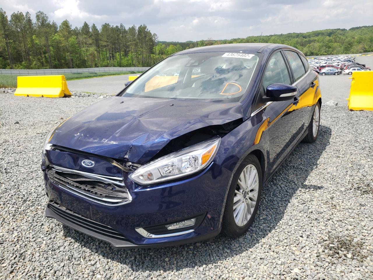 Photo 2 from auction – 2016 FORD FOCUS TITA with VIN 1FADP3N26GL249359