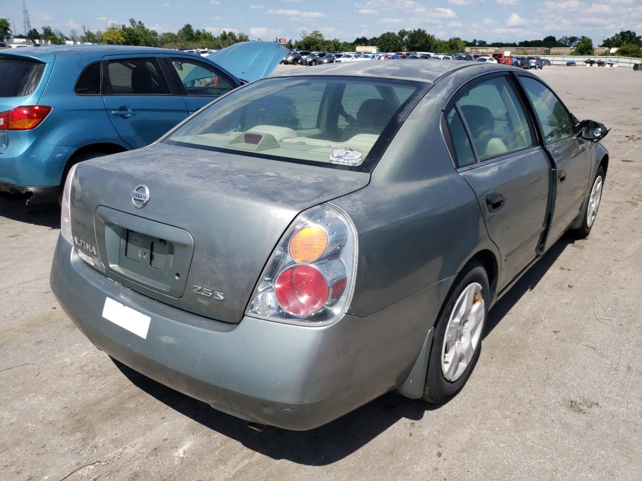 Photo 4 from auction – 2003 NISSAN ALTIMA BAS with VIN 1N4AL11E73C294016