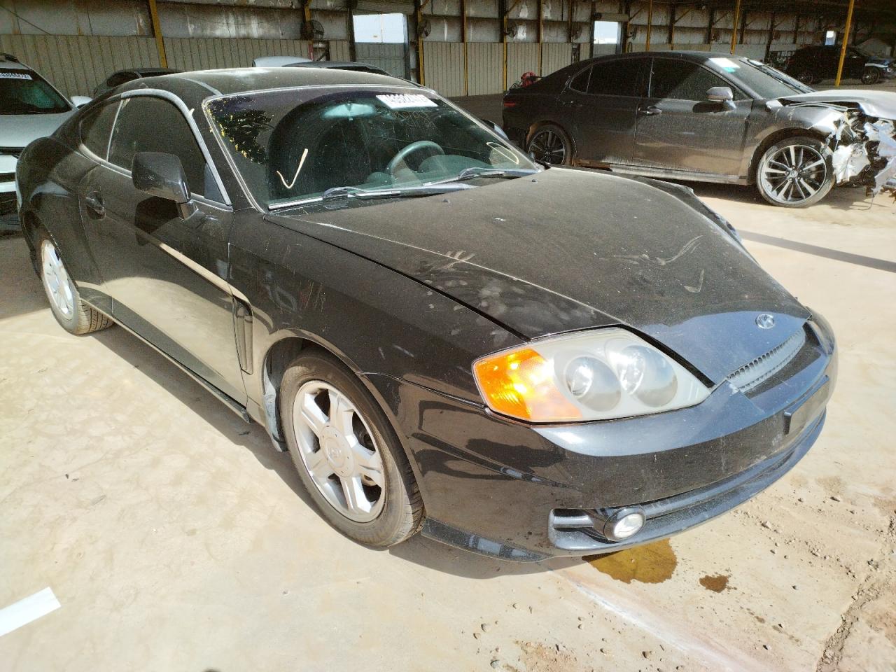 Photo 1 from auction – 2003 HYUNDAI TIBURON with VIN KMHHM65D23U036500