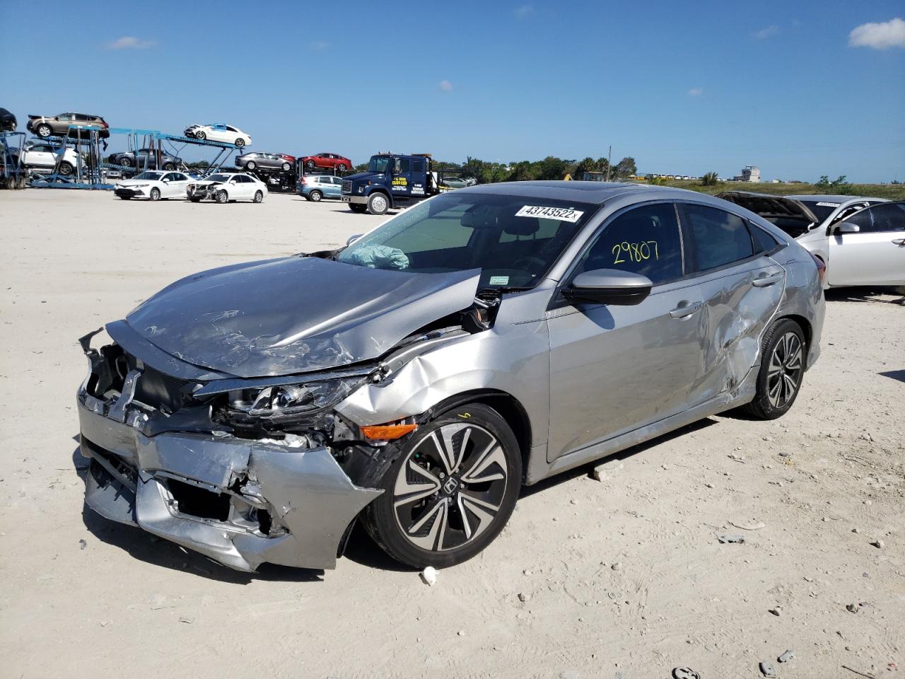 Photo 2 from auction – 2018 HONDA CIVIC EXL with VIN JHMFC1F73JX009990