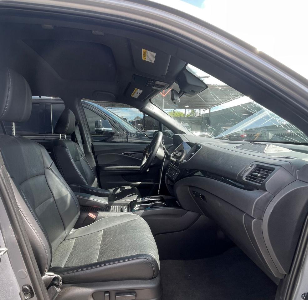 Photo 5 from auction – 2019 HONDA PASSPORT E with VIN 5FNYF8H01KB010190