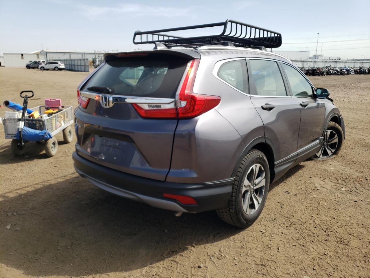 Photo 4 from auction – 2017 HONDA CR-V LX with VIN 7FARW5H31HE005436