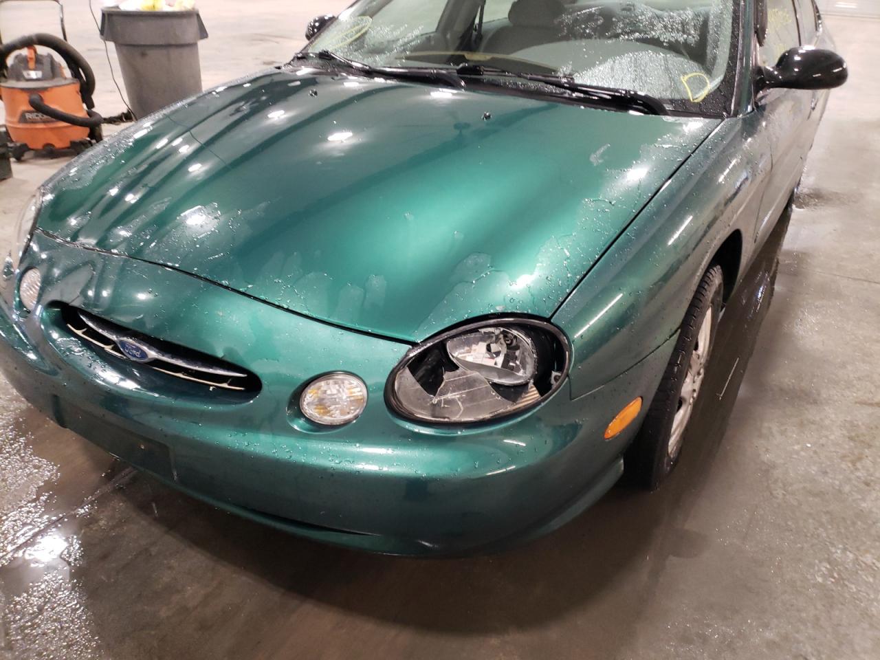 Photo 9 from auction – 1999 FORD TAURUS LX with VIN 1FAFP52UXXG306441