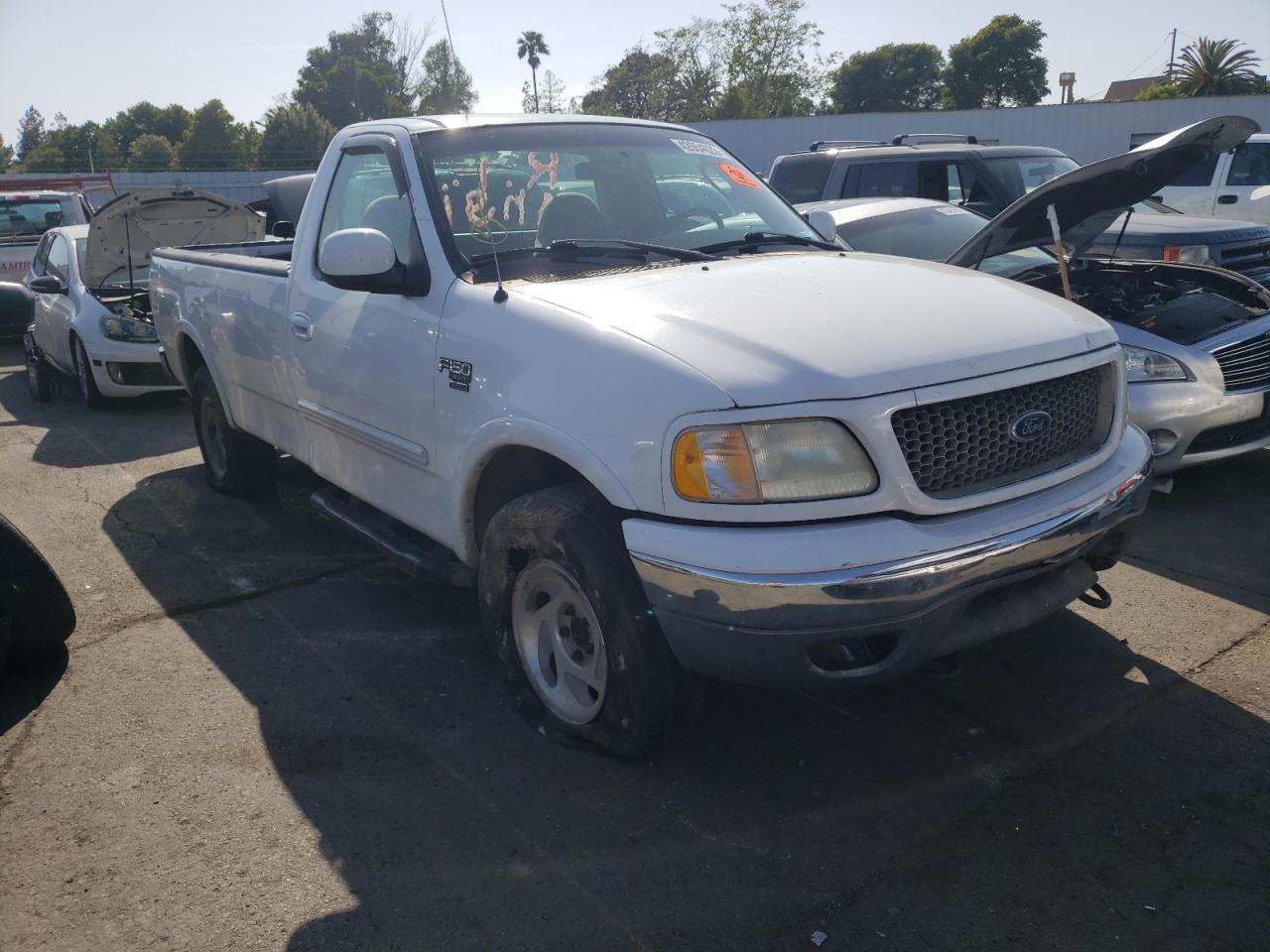 FORD F150 2002 with VIN 1FTRF18L22NB99746 - Photo from auction