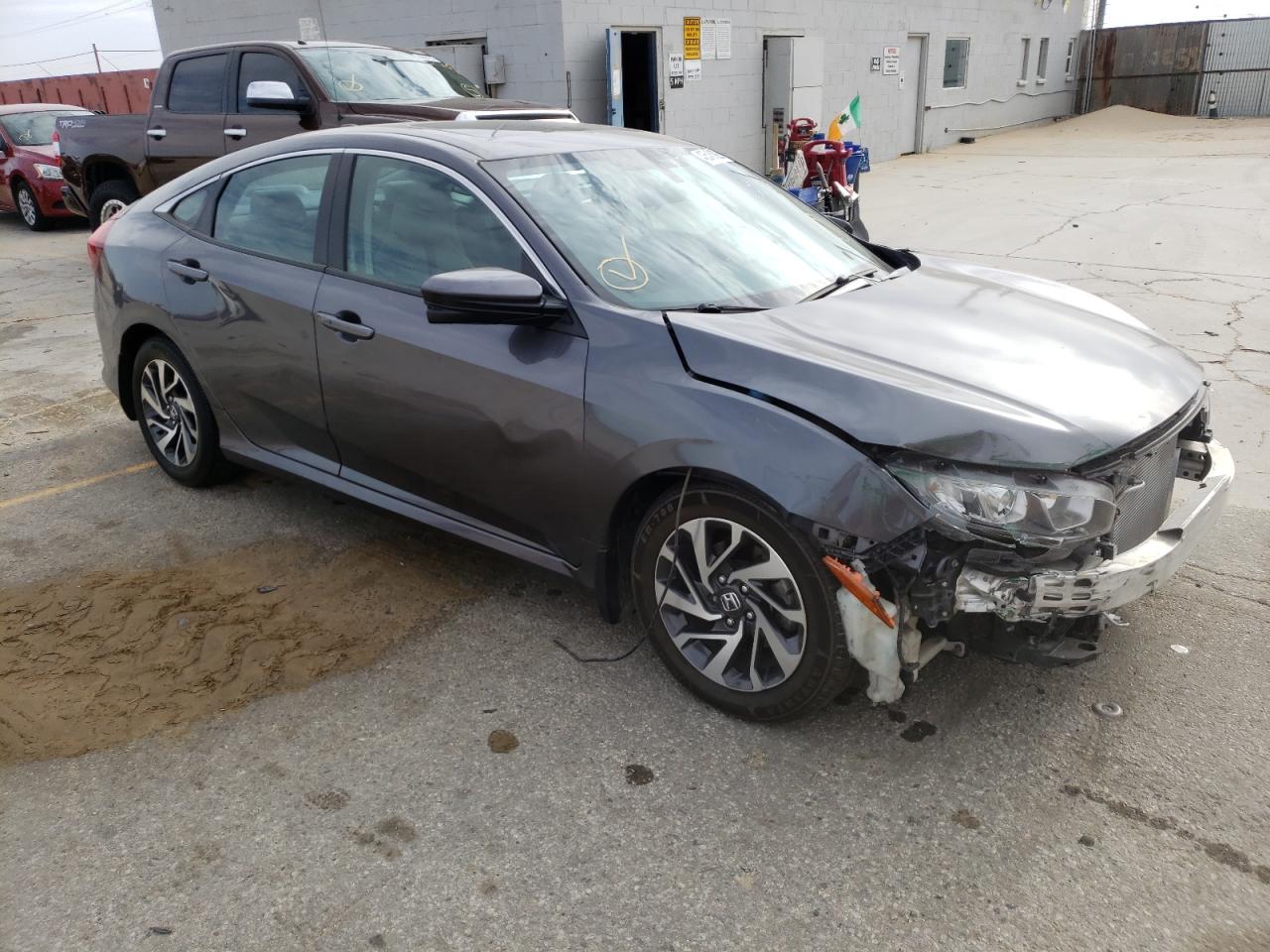 HONDA CIVIC EX 2018 with VIN 2HGFC2F77JH537416 - Photo from auction