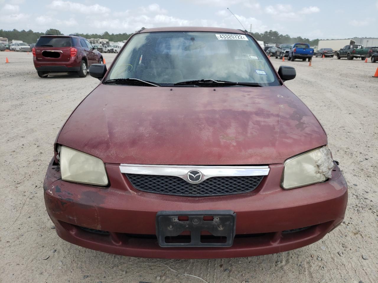 Photo 9 from auction – 1999 MAZDA PROTEGE ES with VIN JM1BJ2220X0118107
