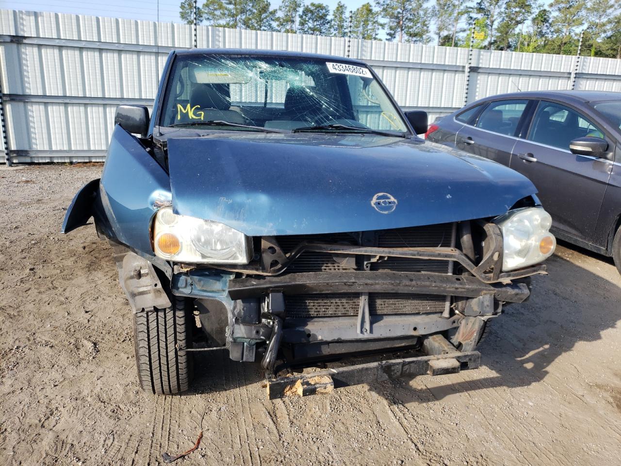 Photo 9 from auction – 2003 NISSAN FRONTIER K with VIN 1N6DD26T93C421153