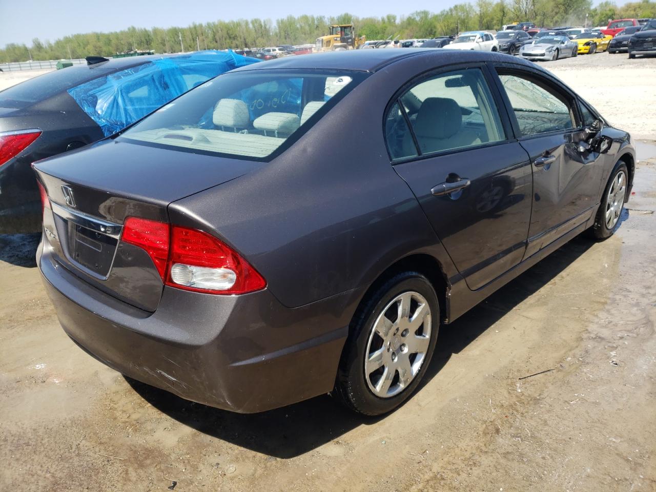 Photo 4 from auction – 2010 HONDA CIVIC LX with VIN 19XFA1F50AE044010