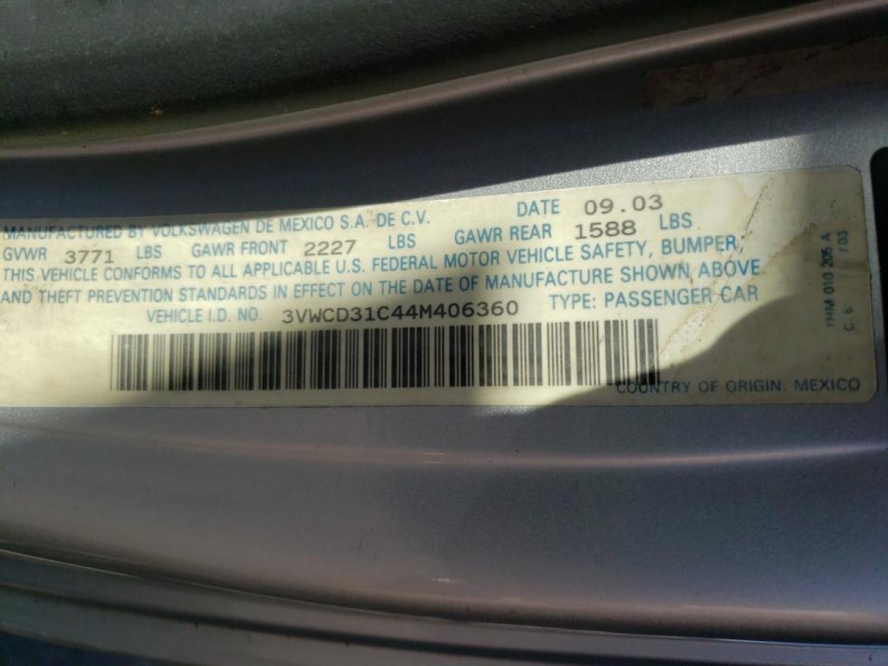 Photo 20 from auction – 2004 VOLKSWAGEN NEW BEETLE with VIN 3VWCD31C44M406360