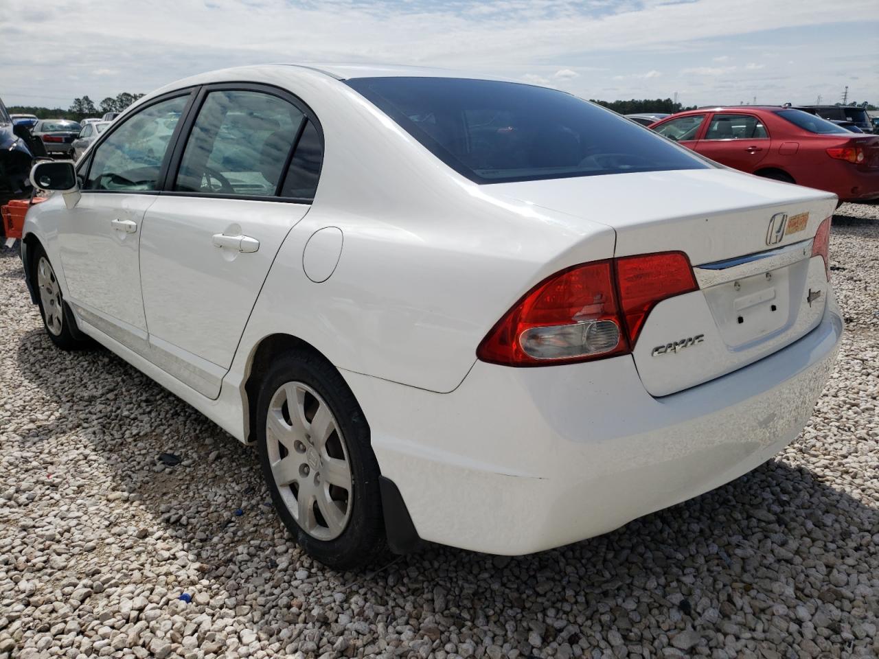 Photo 3 from auction – 2010 HONDA CIVIC LX with VIN 2HGFA1F58AH586641