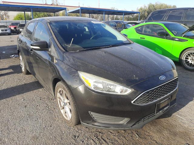 FORD FOCUS SE 2015 with VIN 1FADP3F21FL329956 - Photo from auction