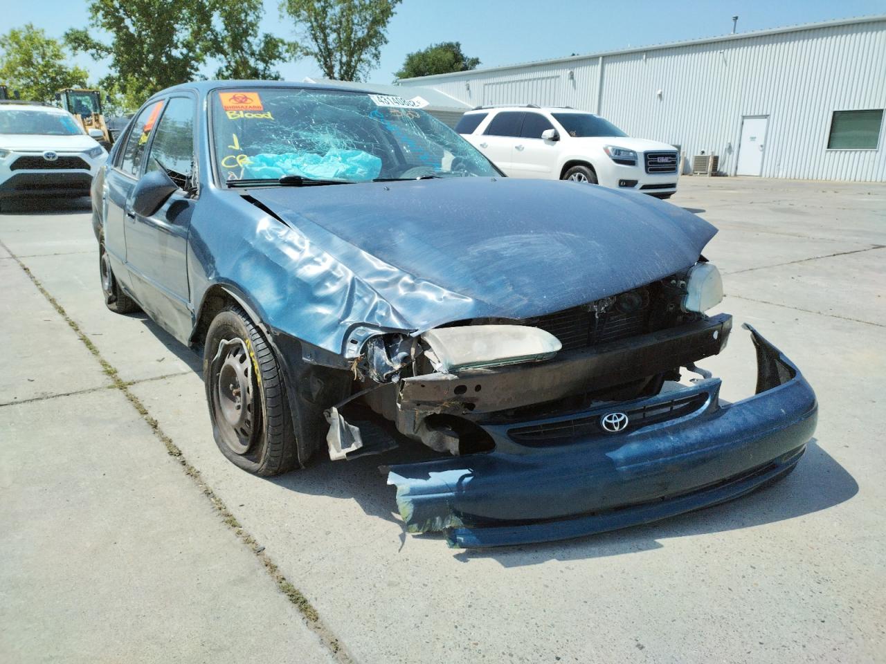 TOYOTA COROLLA VE 1998 with VIN 1NXBR18E1WZ080216 - Photo from auction