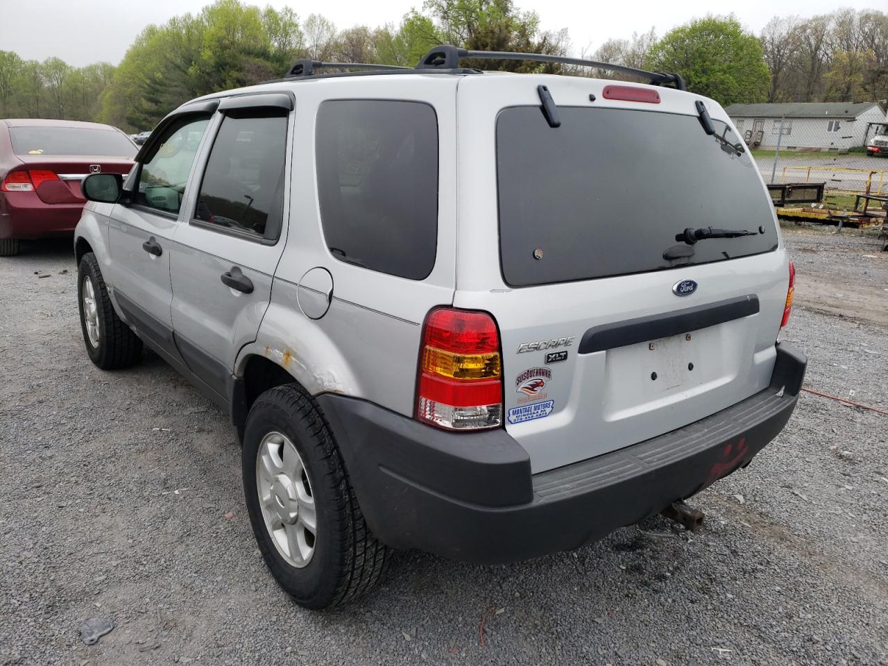 Photo 3 from auction – 2003 FORD ESCAPE XLT with VIN 1FMYU931X3KB34597