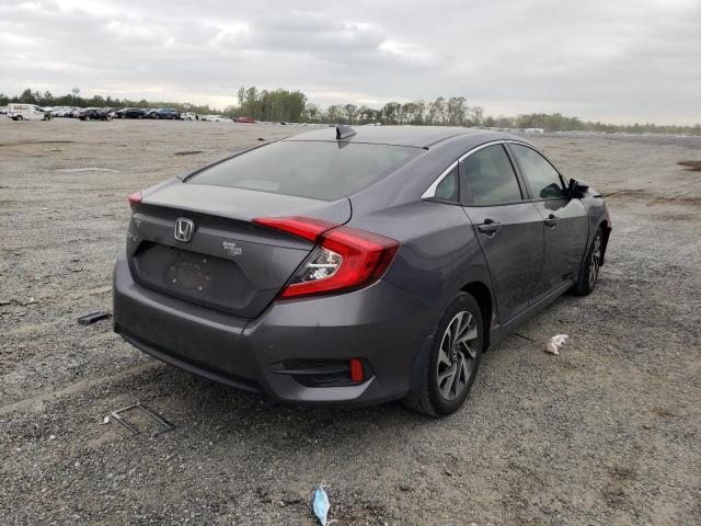 Photo 4 from auction – 2018 HONDA CIVIC EX with VIN 2HGFC2F79JH565847