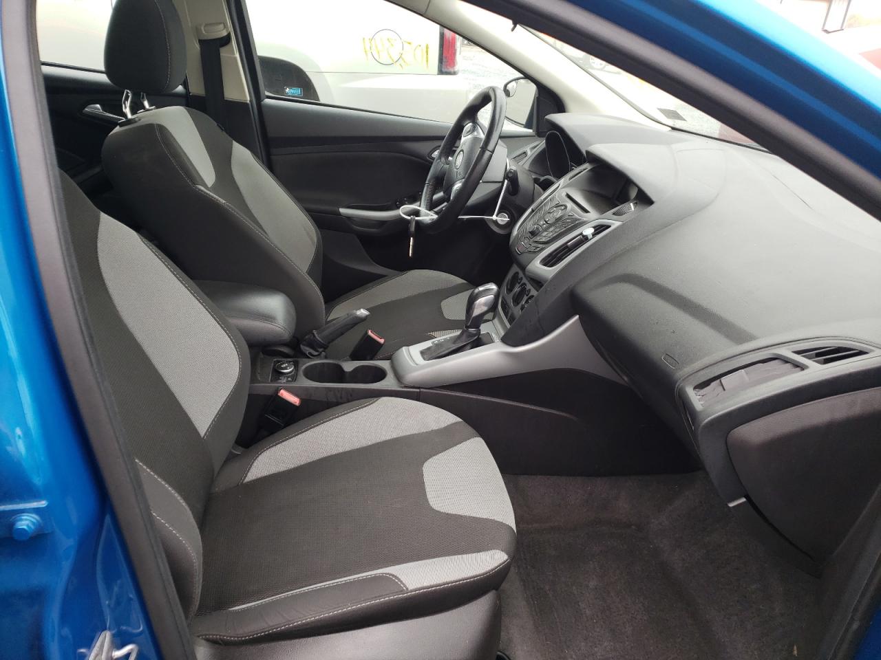 Photo 5 from auction – 2012 FORD FOCUS SE with VIN 1FAHP3K21CL246871