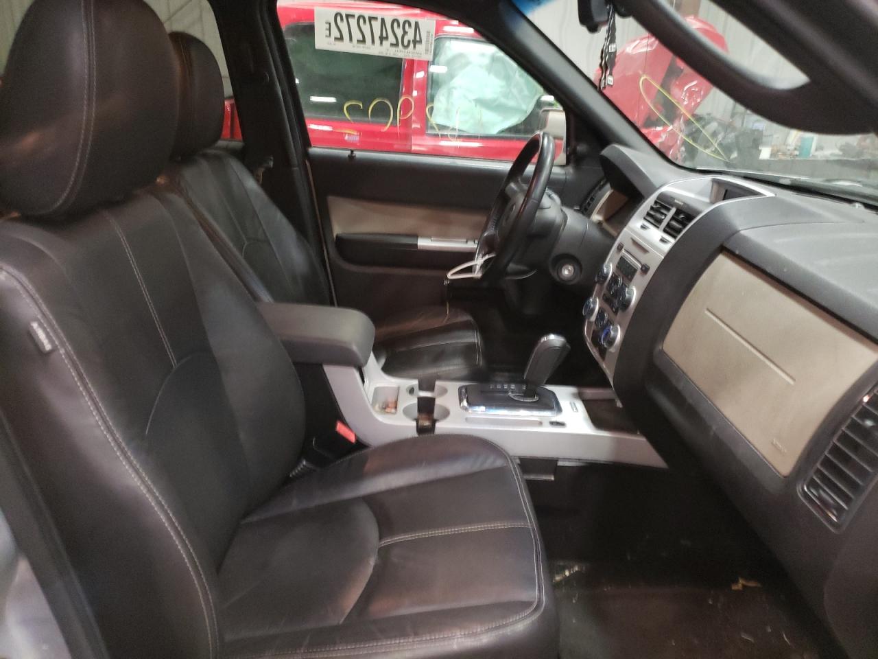Photo 5 from auction – 2010 MERCURY MARINER PR with VIN 4M2CN9H7XAKJ20487