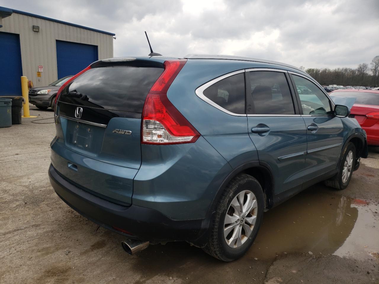 Photo 4 from auction – 2014 HONDA CR-V EXL with VIN 5J6RM4H77EL045229