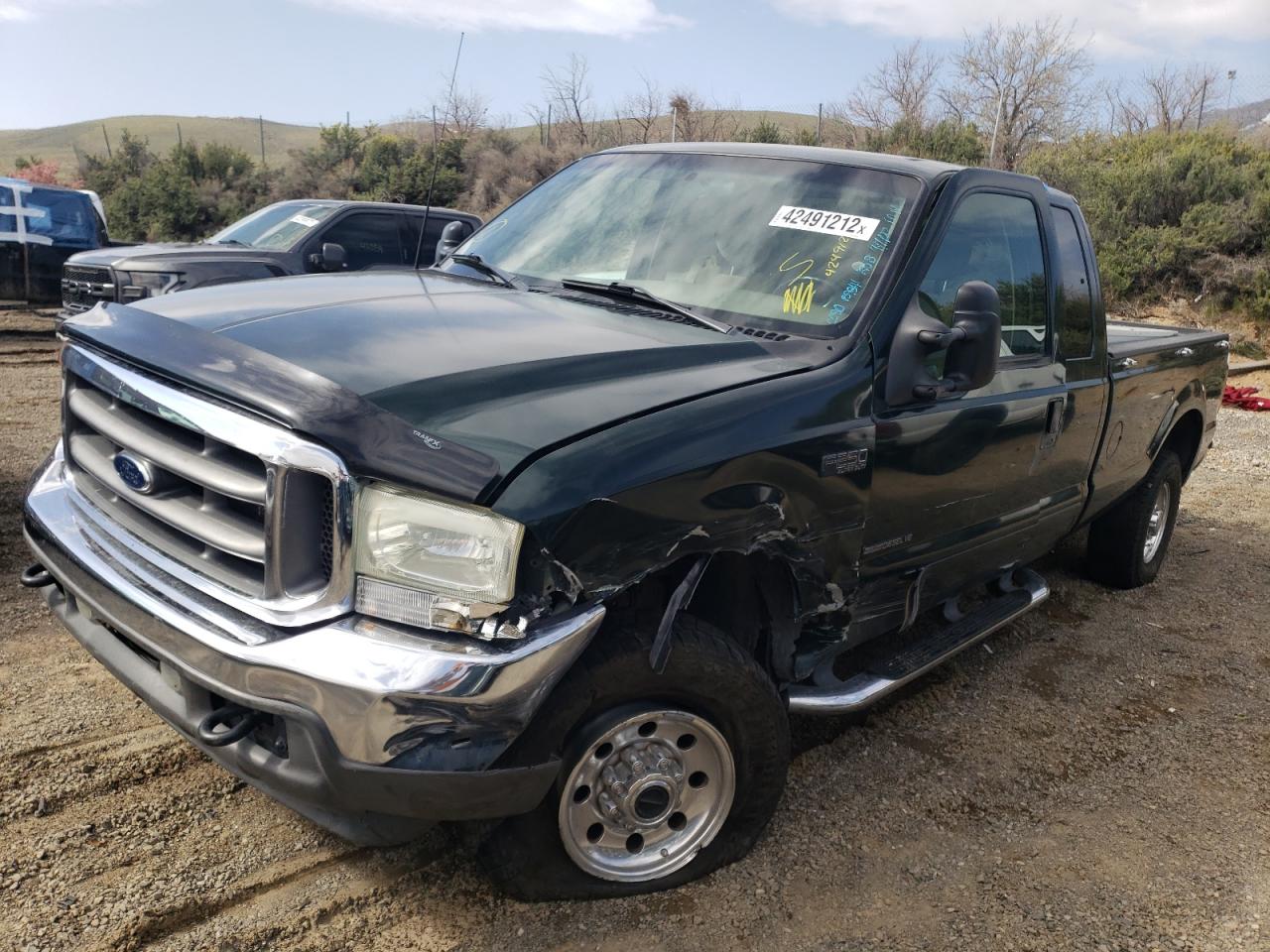 Photo 2 from auction – 2002 FORD F250 SUPER with VIN 1FTNX21F82EA90908