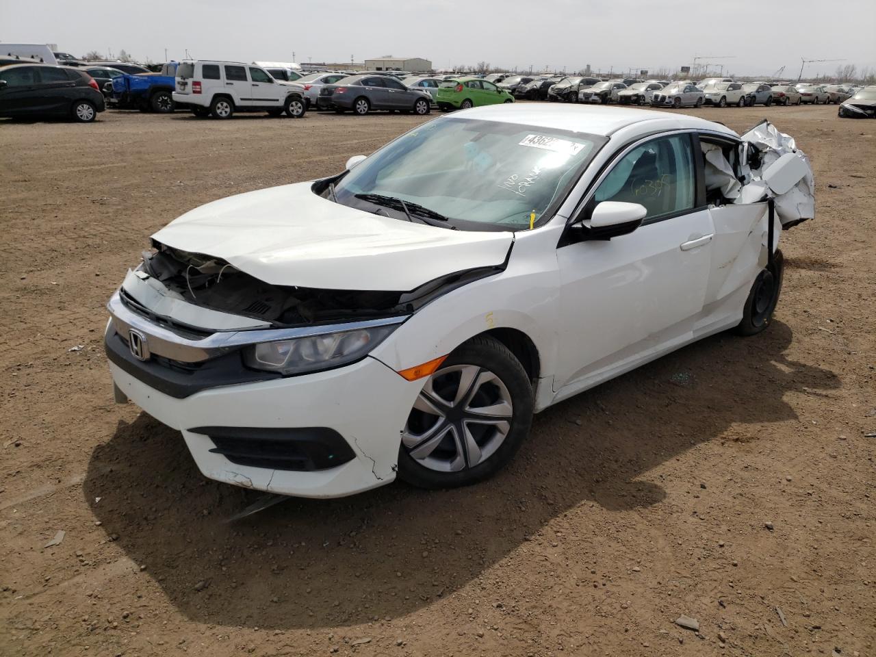 Photo 2 from auction – 2016 HONDA CIVIC LX with VIN 2HGFC2F57GH523085