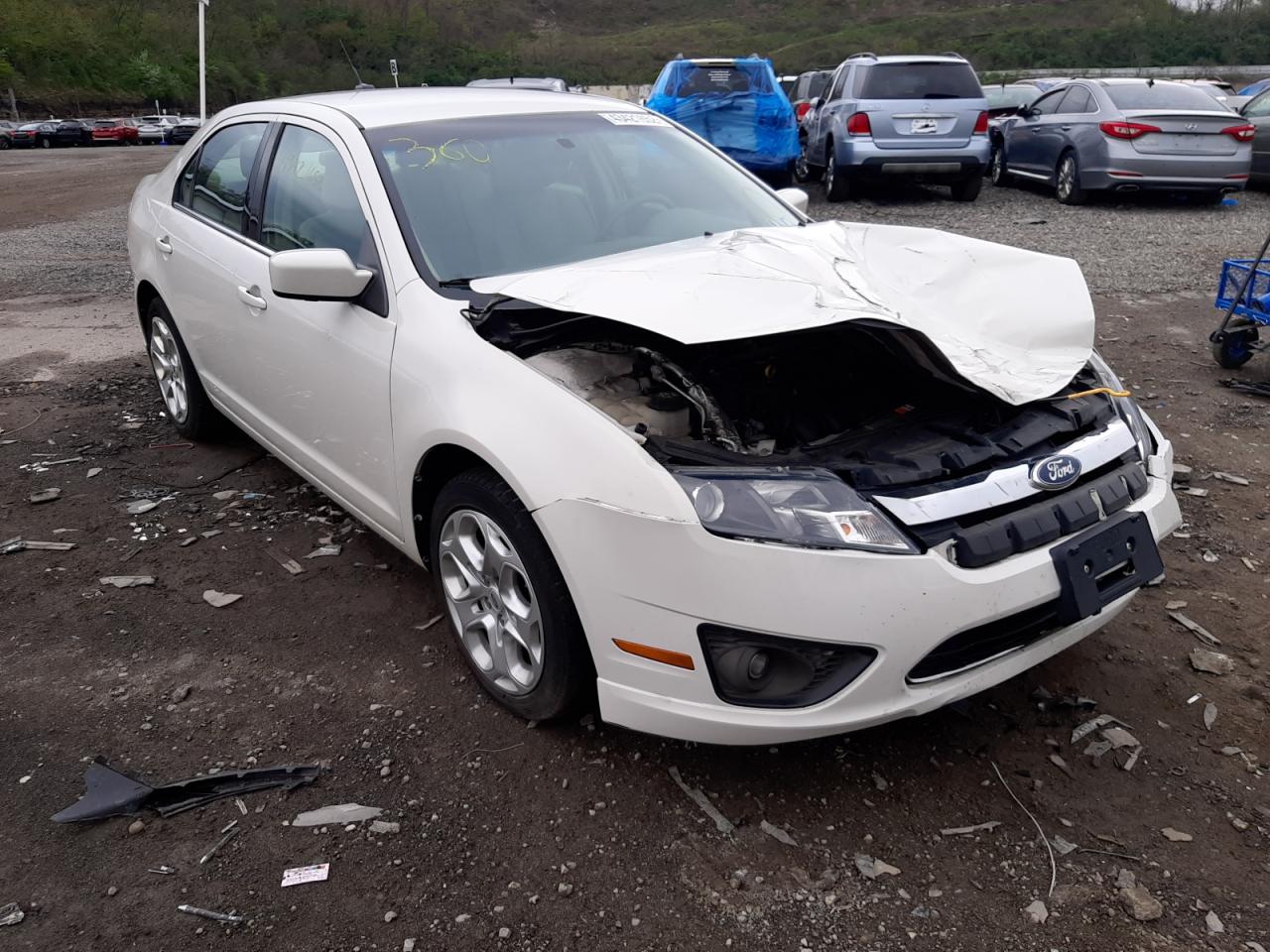 FORD FUSION SE 2011 with VIN 3FAHP0HA4BR205941 - Photo from auction