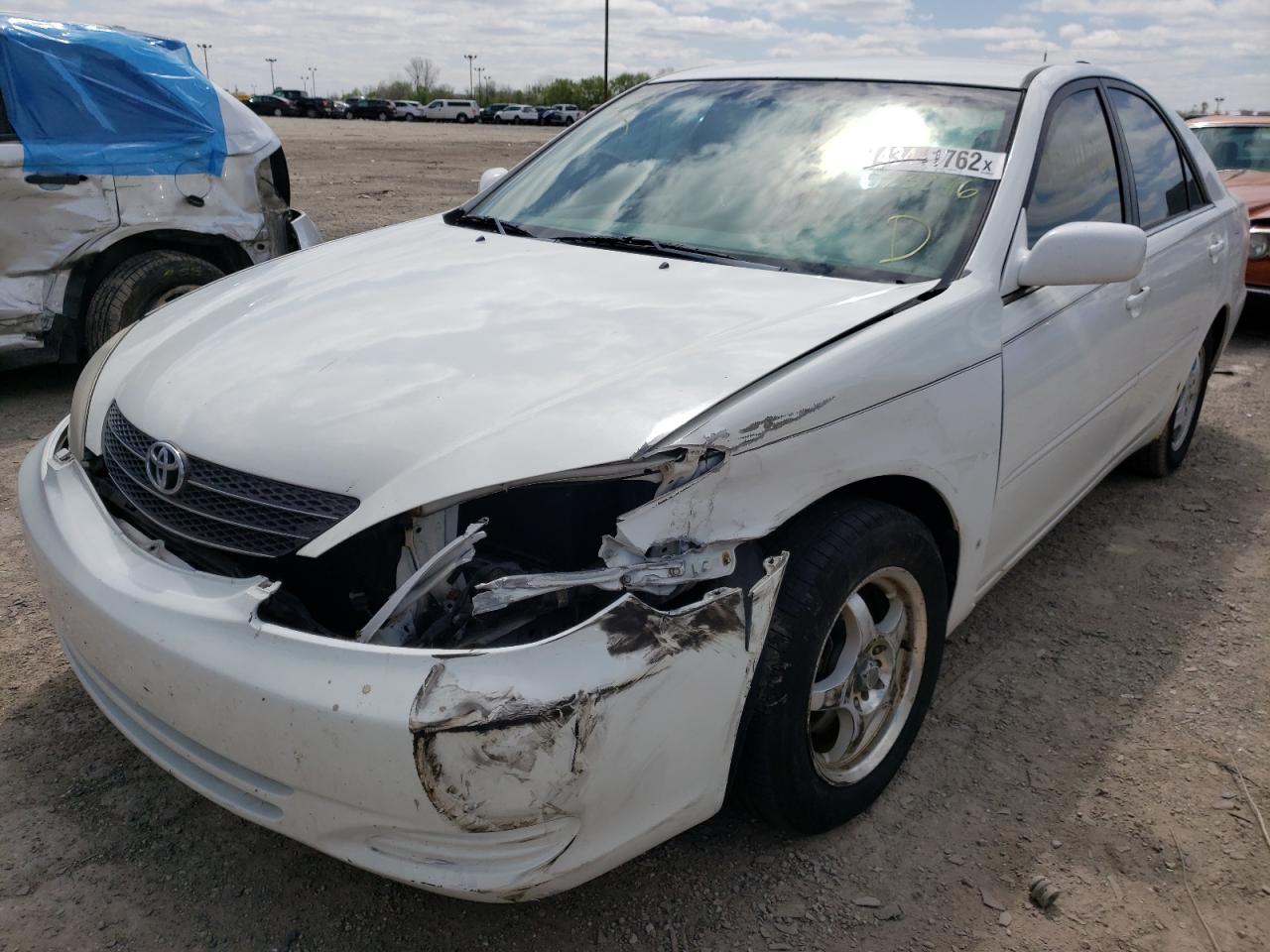 Photo 2 from auction – 2002 TOYOTA CAMRY LE with VIN 4T1BF32K42U023246