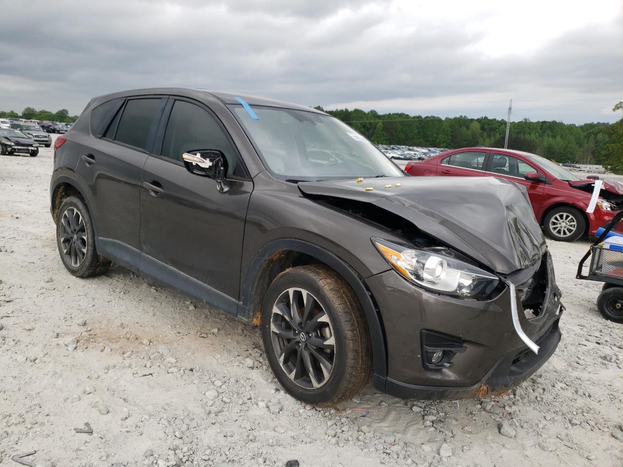 Photo 1 from auction – 2016 MAZDA CX-5 GT with VIN JM3KE2DY1G0895103