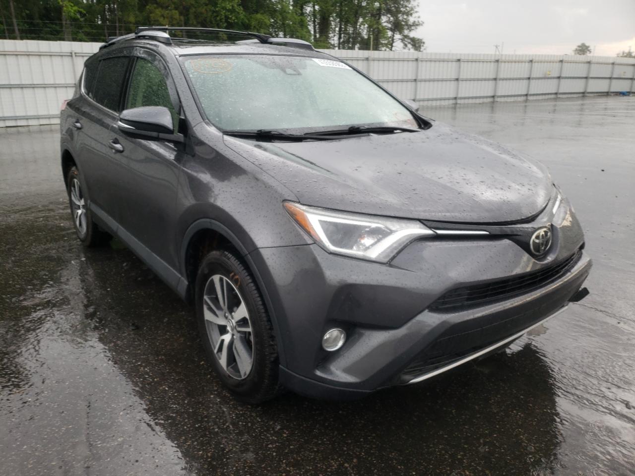 Photo 1 from auction – 2017 TOYOTA RAV4 XLE with VIN JTMWFREV1HJ703422