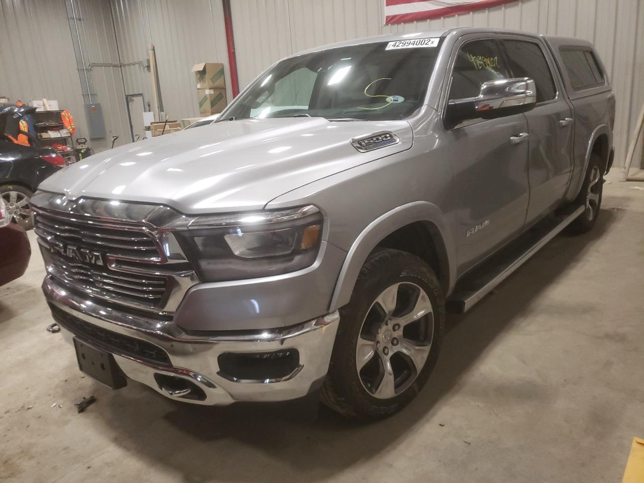 Photo 2 from auction – 2021 RAM 1500 LARAM with VIN 1C6SRFJT8MN677338