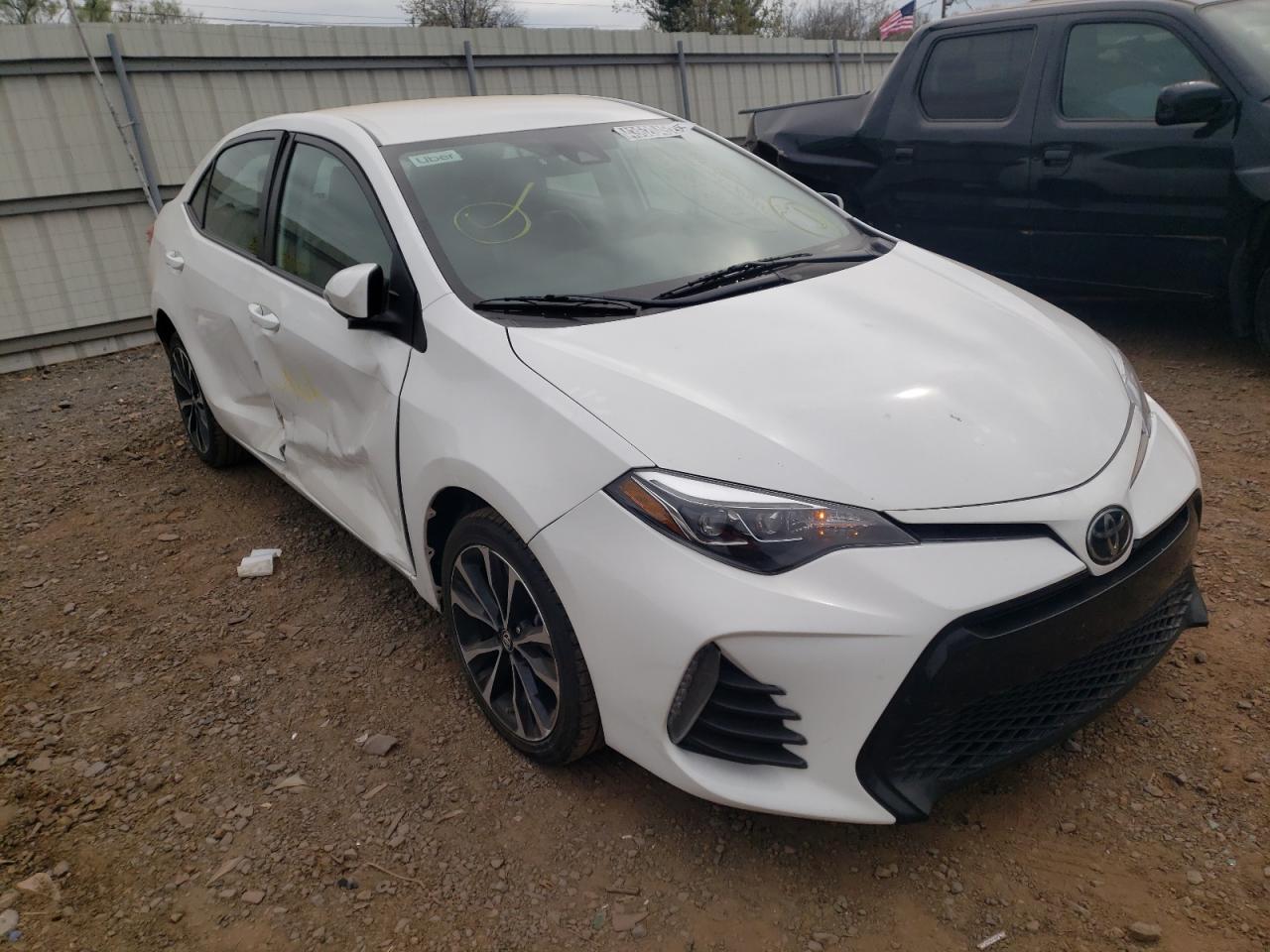 TOYOTA COROLLA L 2019 with VIN 5YFBURHE0KP919345 - Photo from auction