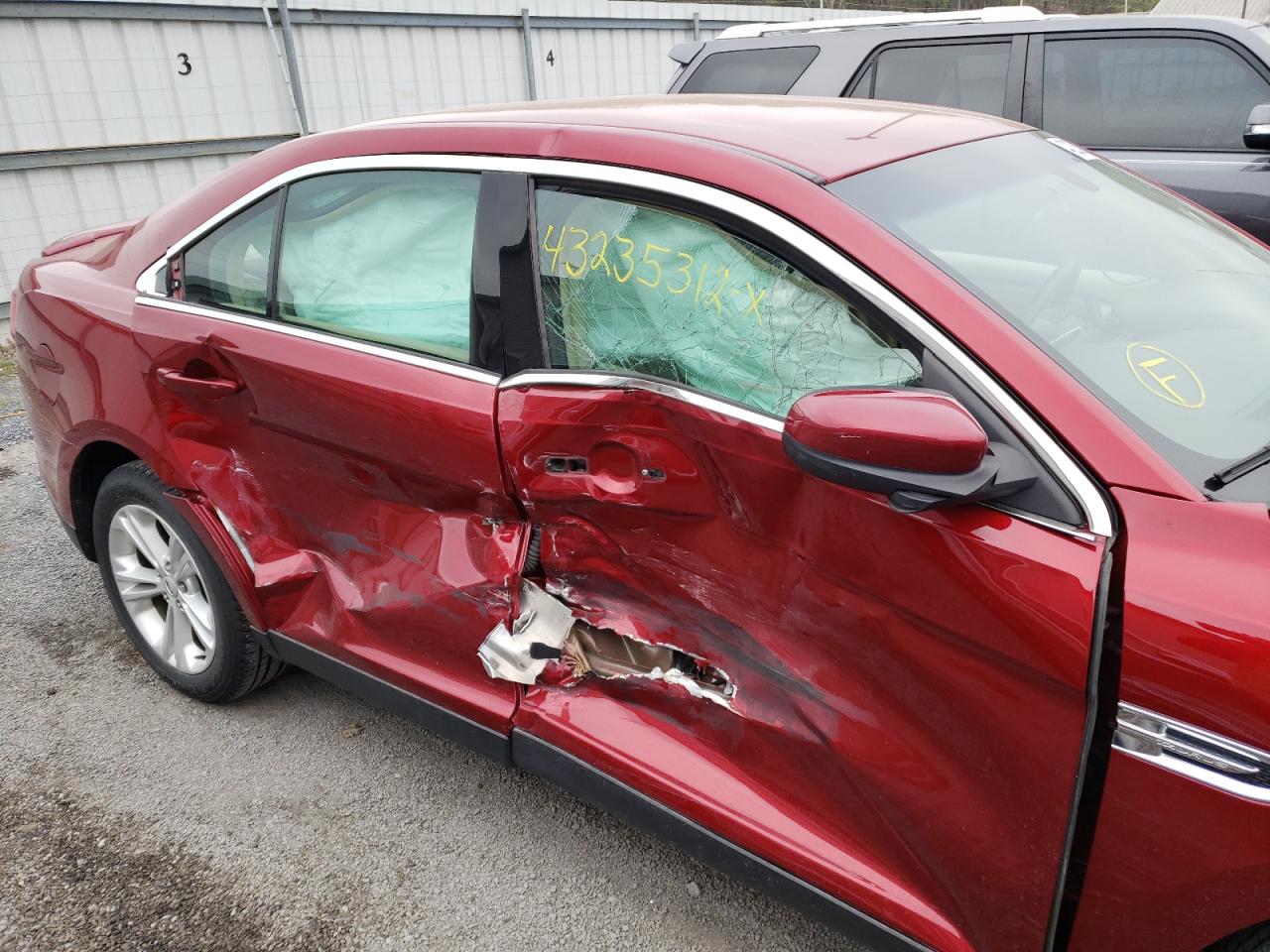 Photo 9 from auction – 2013 FORD TAURUS SEL with VIN 1FAHP2E85DG166459