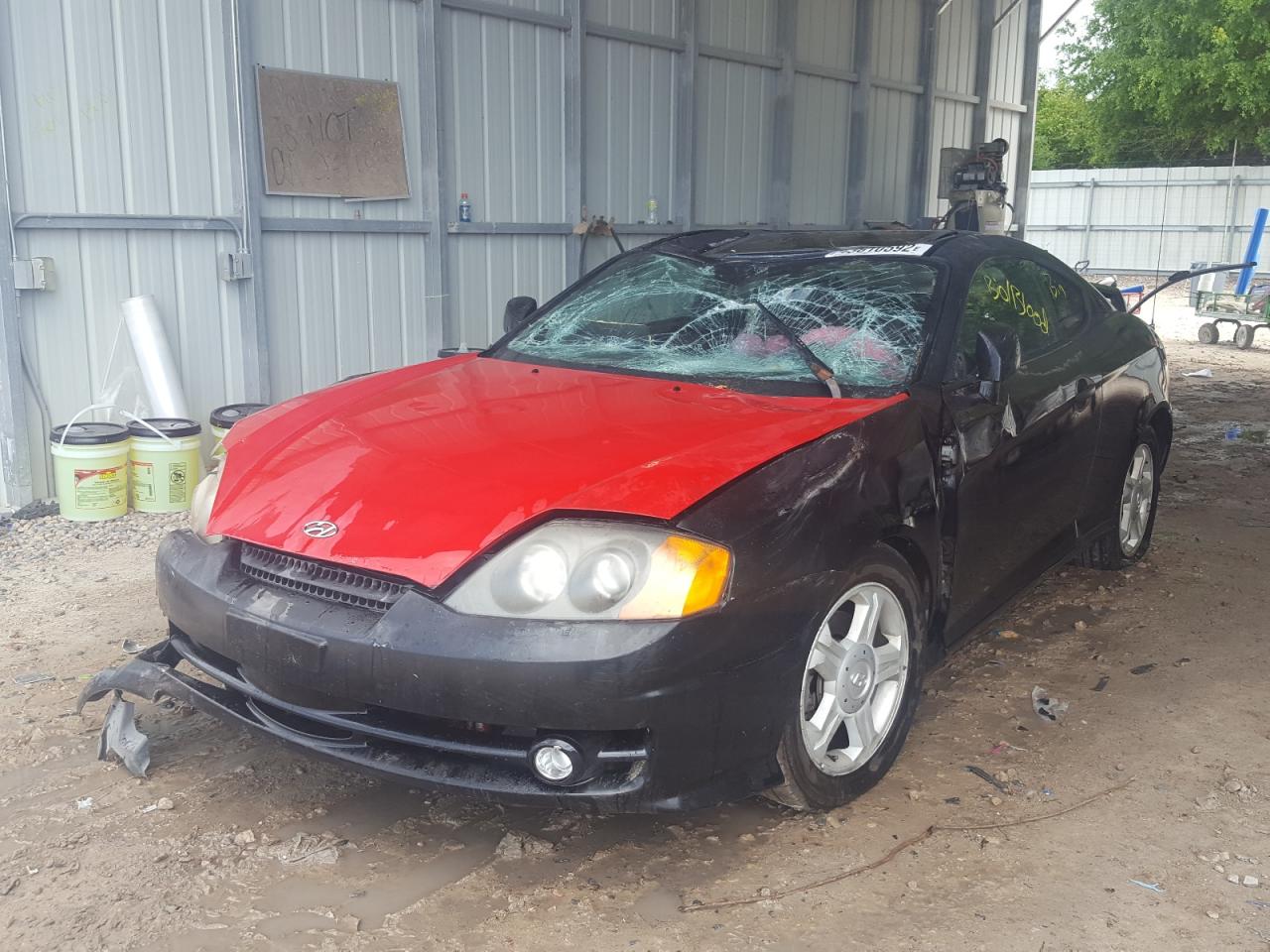 Photo 2 from auction – 2004 HYUNDAI TIBURON with VIN KMHHM65D14U140249