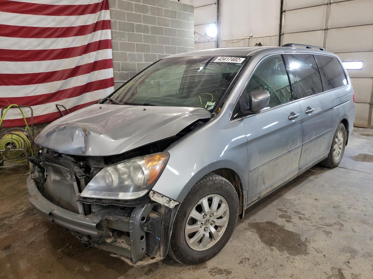 Photo 2 from auction – 2010 HONDA ODYSSEY EX with VIN 5FNRL3H67AB033458