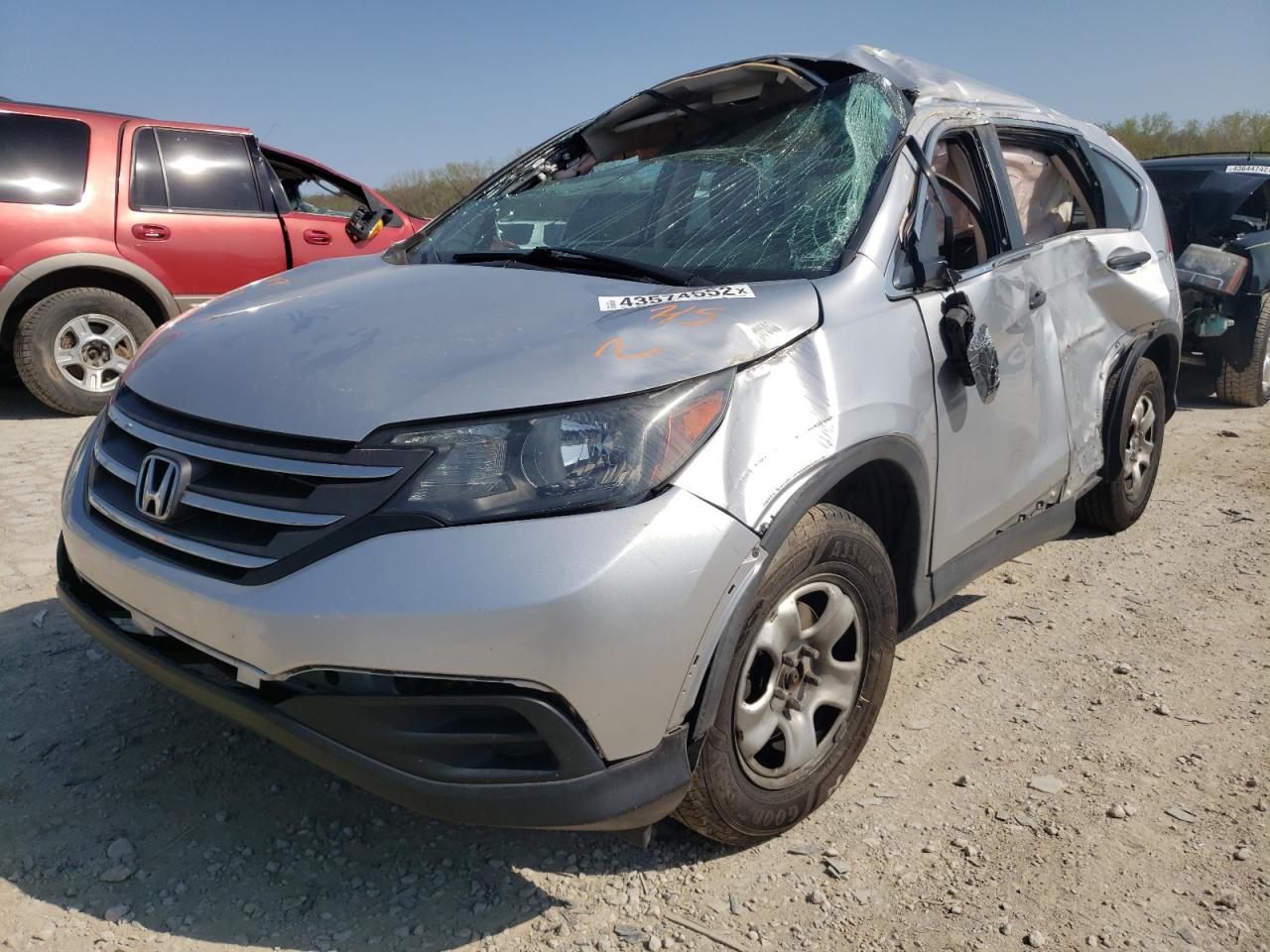 Photo 2 from auction – 2014 HONDA CR-V LX with VIN 5J6RM4H38EL076549