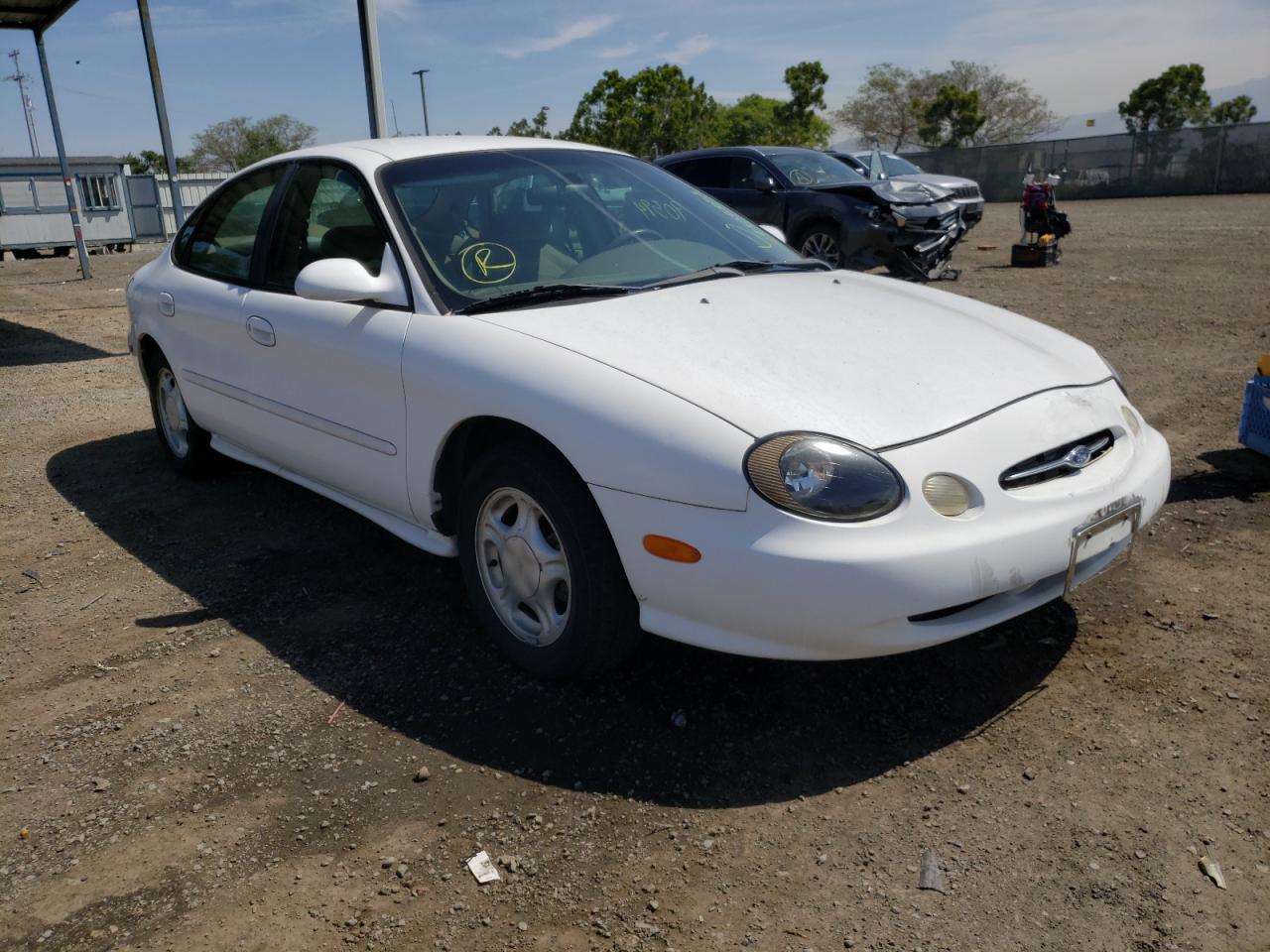 FORD TAURUS LX 1998 with VIN 1FAFP52U2WG104420 - Photo from auction