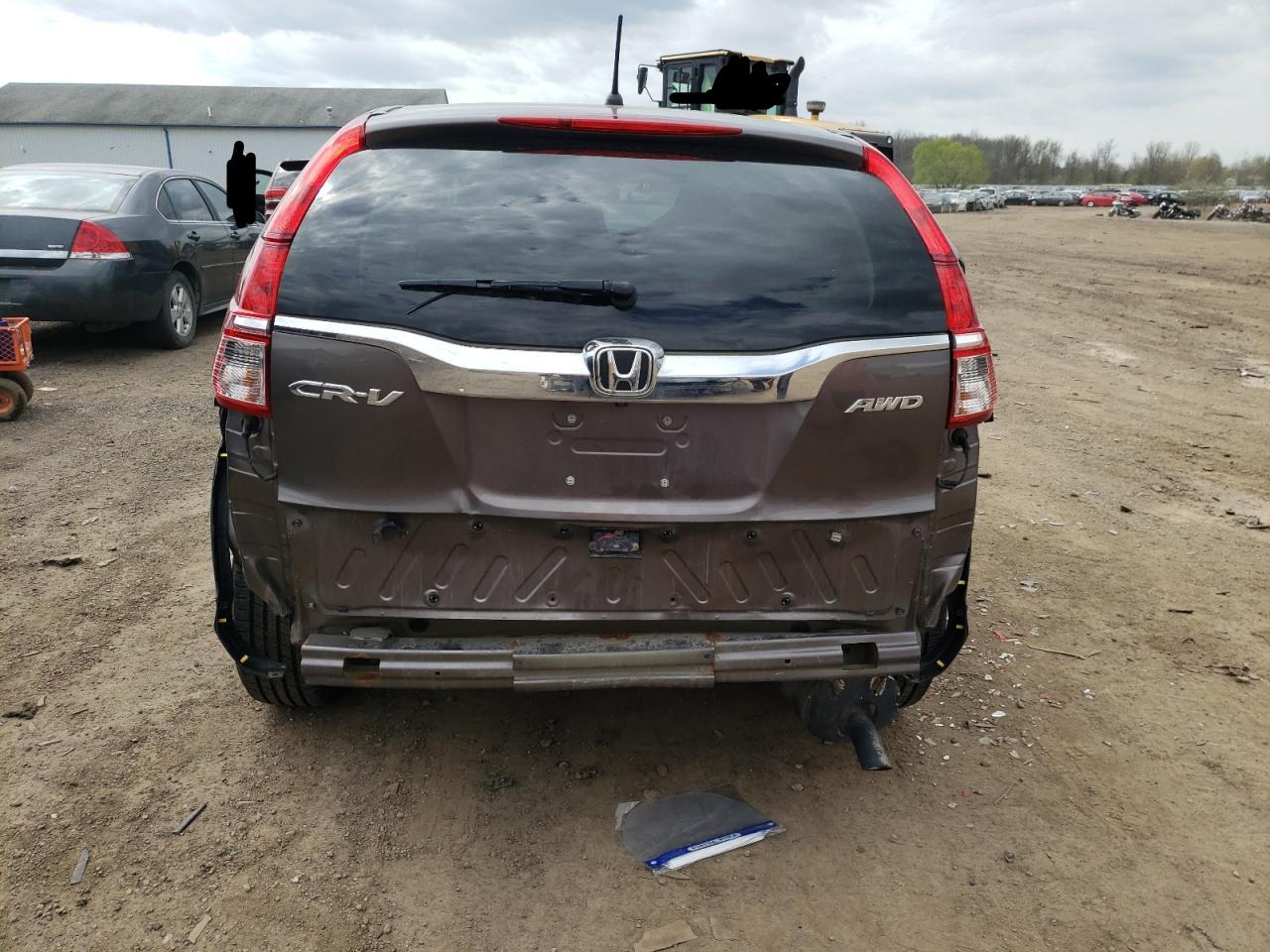Photo 9 from auction – 2016 HONDA CR-V SE with VIN 2HKRM4H42GH654845