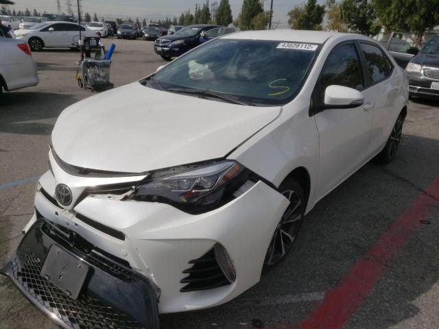 Photo 2 from auction – 2018 TOYOTA COROLLA L with VIN 5YFBURHEXJP802922
