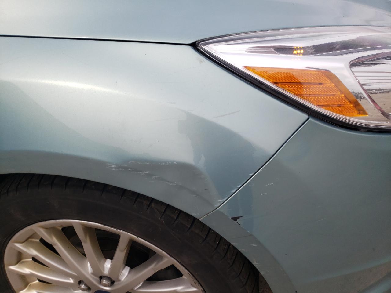 Photo 9 from auction – 2012 FORD FOCUS BEV with VIN 1FAHP3R43CL441944