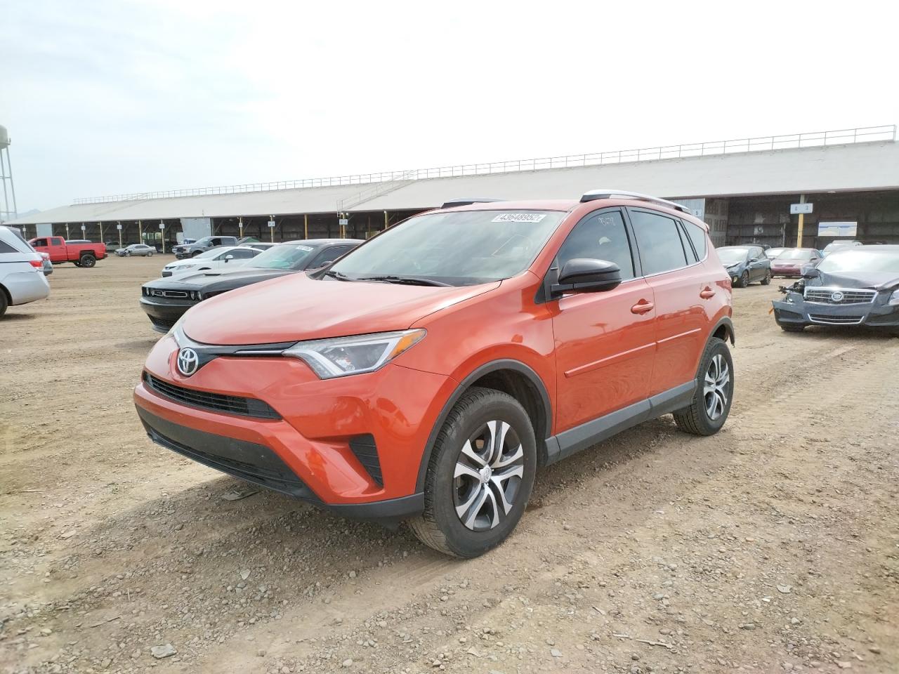 Photo 2 from auction – 2016 TOYOTA RAV4 LE with VIN JTMZFREV0GJ080144