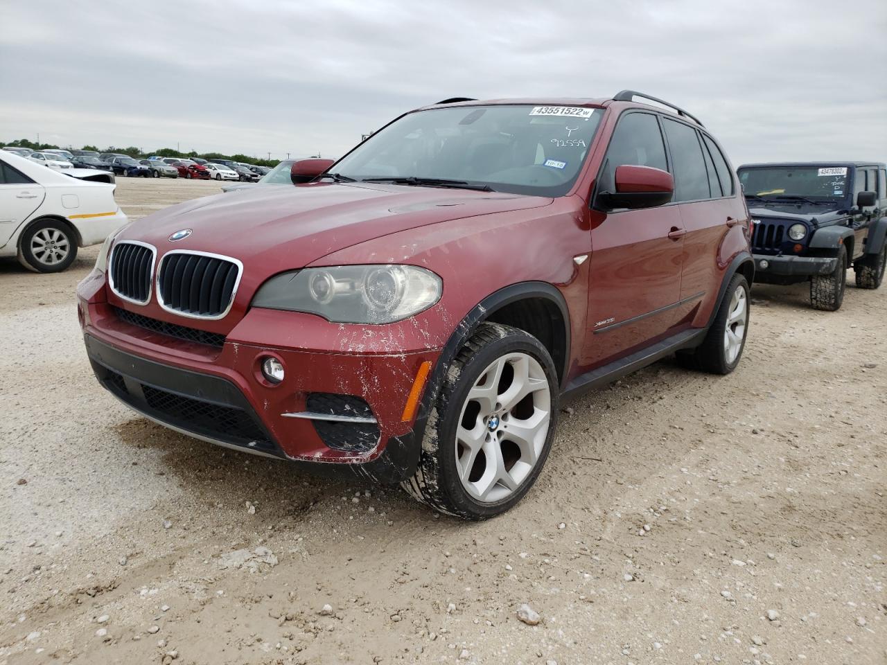 Photo 2 from auction – 2011 BMW X5 XDRIVE3 with VIN 5UXZV4C57BL402668